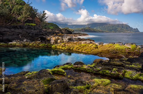Long exposure of the calm waters of Queen s Bath  a rock pool off Princeville on north shore of Kauai