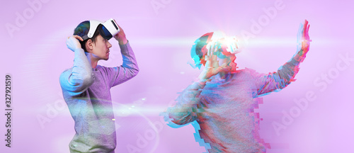 Man wearing virtual reality headset. Image with glitch effect