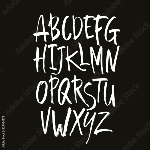 Vector Acrylic Brush Style Hand Drawn Alphabet Font. Calligraphy alphabet on a black background. Ink hand lettering.