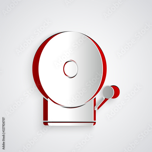 Paper cut Ringing alarm bell icon isolated on grey background. Fire alarm system. Service bell, handbell sign, notification symbol. Paper art style. Vector Illustration