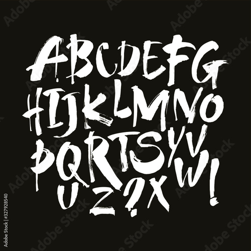 Vector Acrylic Brush Style Hand Drawn Alphabet Font. Calligraphy alphabet on a black background. Ink hand lettering.
