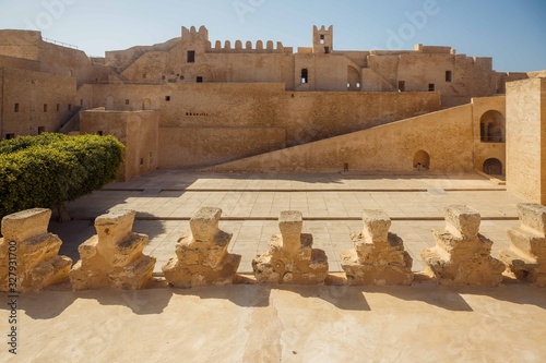 Ribat Hartem Fortress is one of interesting sights in Monastir,Tunisia, North Africa. Front view of the Ribat fortess from the courtyard photo