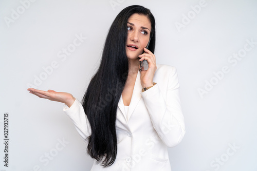 Angry woman talking on the phone