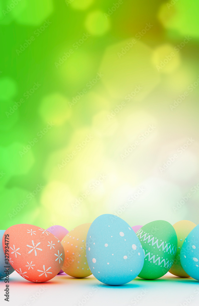 Colorful Easter eggs on green bokeh background, pastel, hand painted Easter eggs. Colorful Easter eggs on green bokeh background, pastel, hand painted Easter eggs.