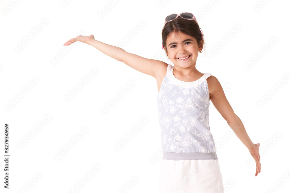 Little girl in white dress laughing and posing in jump, stretching out her arms up, isolated on white background Little girl in white dress laughing and posing in jump, stretching out her arms up, isolated on white background