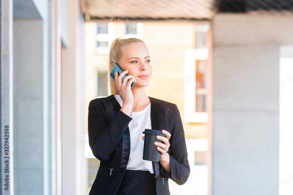 Outdoor photo of young and attractive businesswoman or student. Business and education concept. Outdoor photo of young and attractive businesswoman or student. Business and education concept.