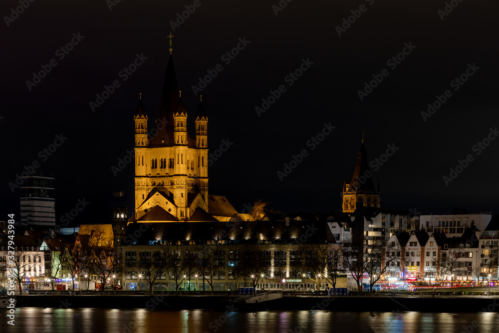 Great St. Martin Cathedral and old Town Hall are visible landmarks in Cologne old town