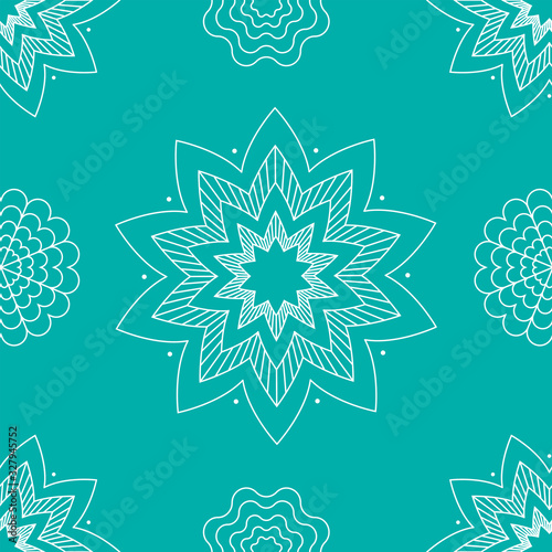 White snowflakes or mandala frost patterns on turquoise background seamless
