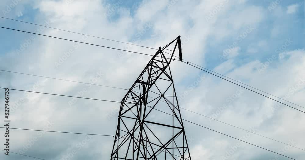 Time Lapse of Electric High Voltage Electricity Tower and power lines ...