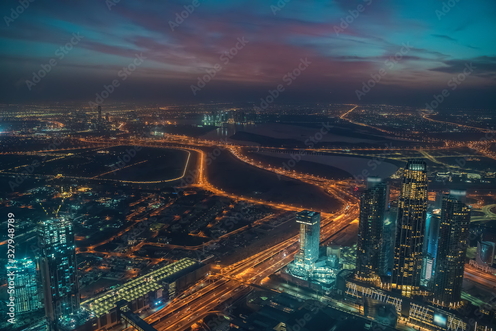 Fototapeta premium Dubai skyline before sunrise, UAE, panoramic view from above.