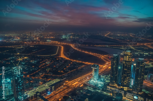 Dubai skyline before sunrise, UAE, panoramic view from above.