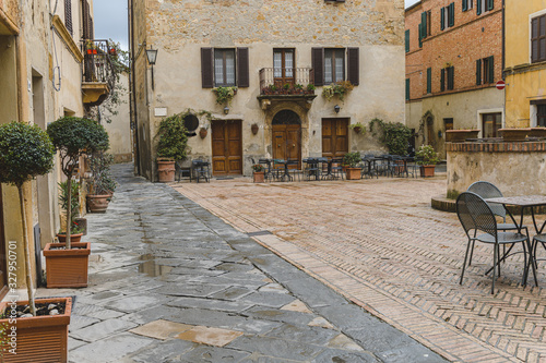 Fototapeta Naklejka Na Ścianę i Meble -  Walk on a rainy day through the streets of the beautiful town, Pienza, Tuscany
