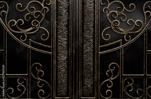 Metal gates framed by forged elements