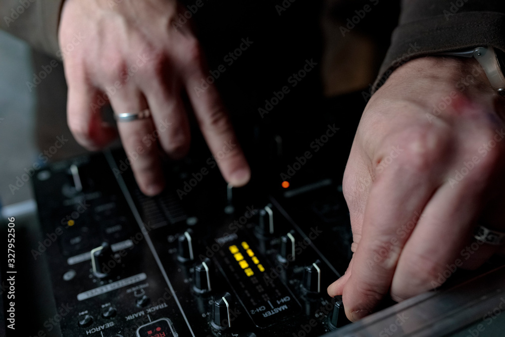 dj mixing music in club