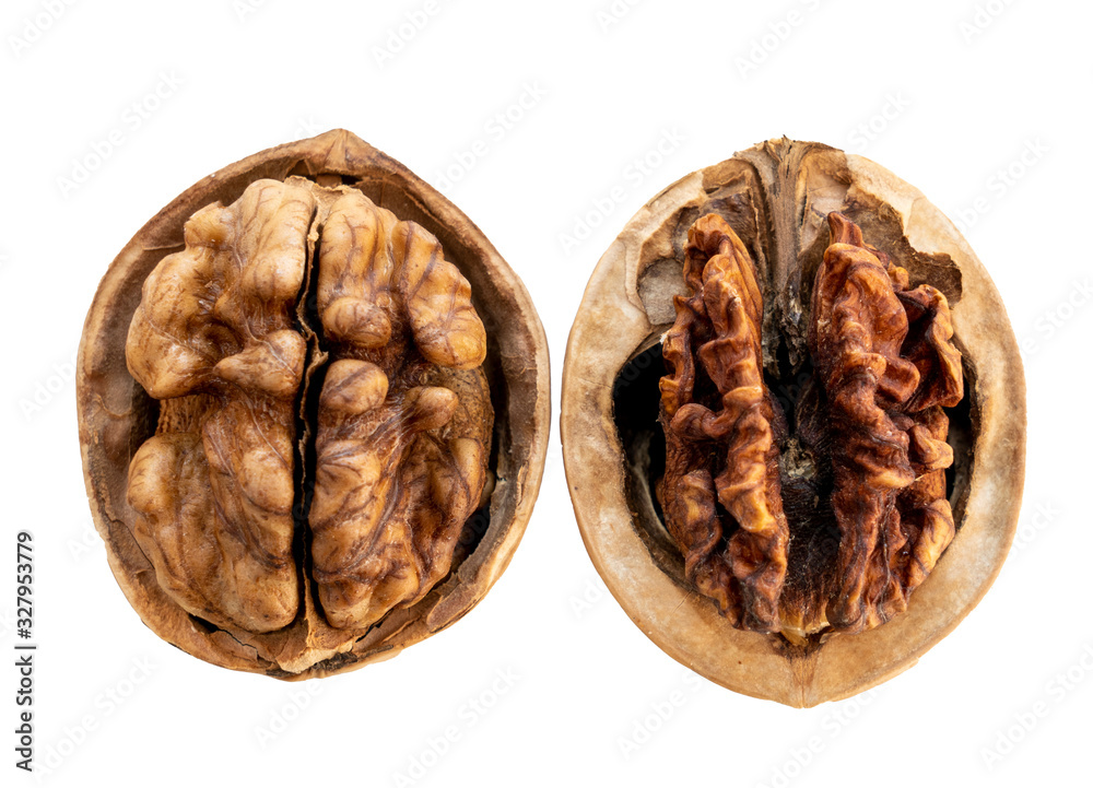 Two open walnuts in a shell , a good walnut and a spoiled walnut, isolate on a white background Two open walnuts in a shell , a good walnut and a spoiled walnut, isolate on a white background