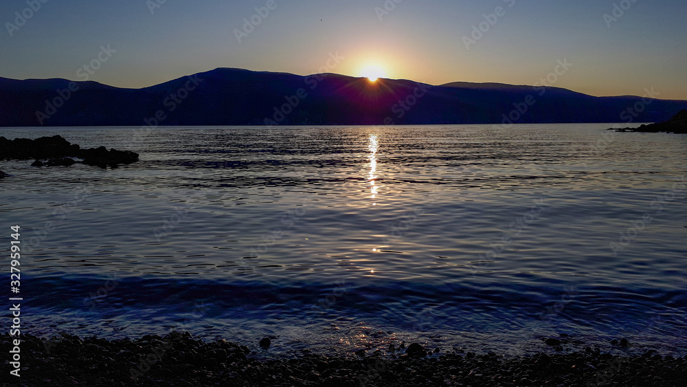 Fototapeta premium Sunset at the sea on Magneli Beach, Krk, Croatia