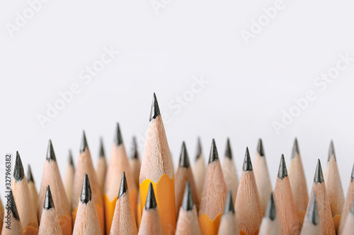 Many pencils on light background