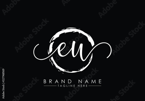 E and U Initial handwriting logo design with brush circle. handwritten logo for fashion  team  wedding  luxury logo.