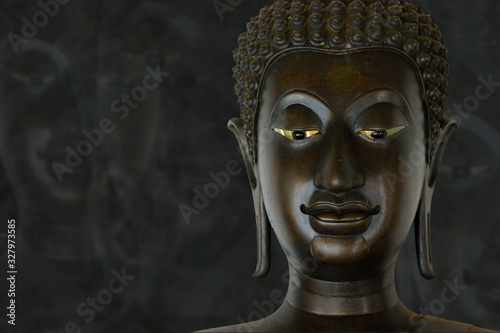 head of statue of buddha in buddhist temple 