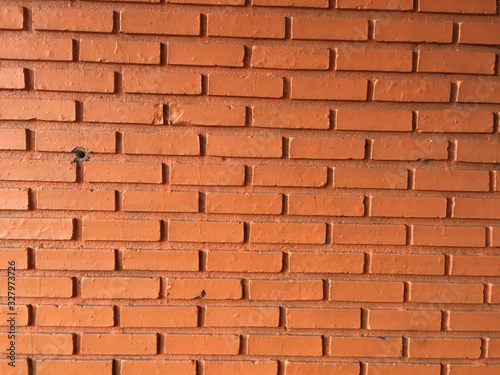 Orange brick wallpaper