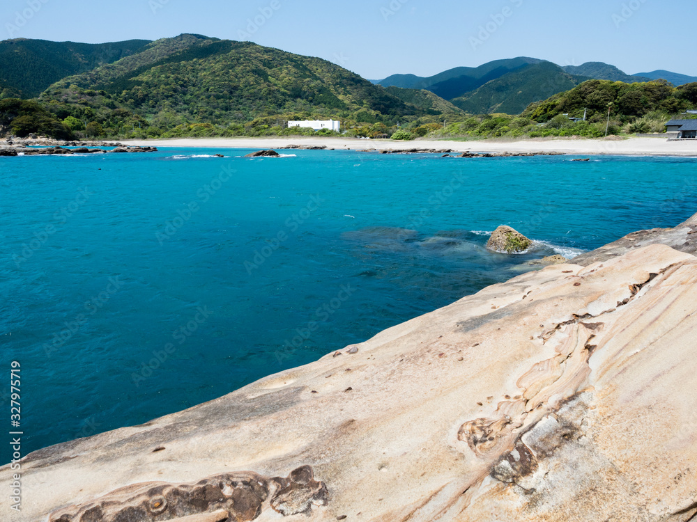 Sandstone rock formations and clear blue waters at Tatsukushi coast - a natural scenic landmark near Tosashimizu, Kochi prefecture, Japan