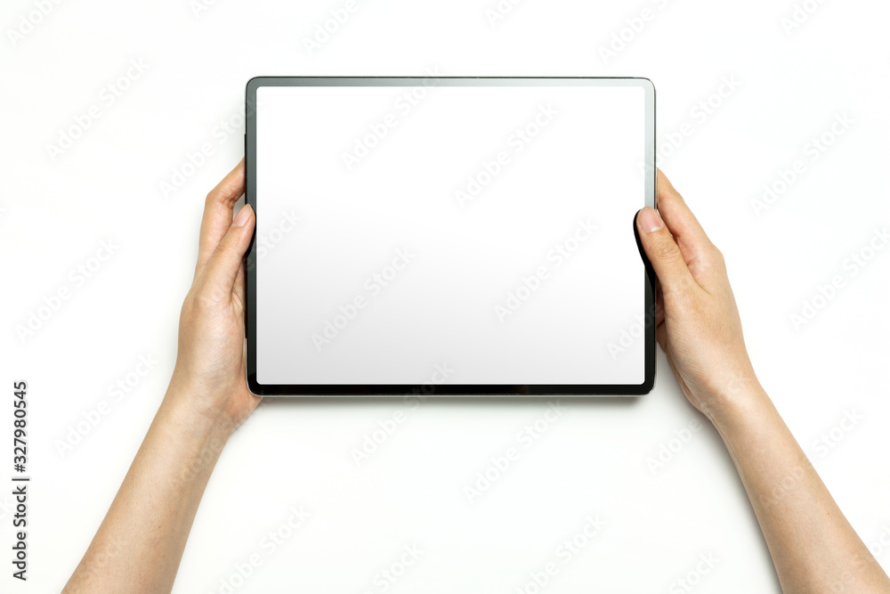 Woman hand hold a tablet isolated on white. Woman hand hold a tablet isolated on white.
