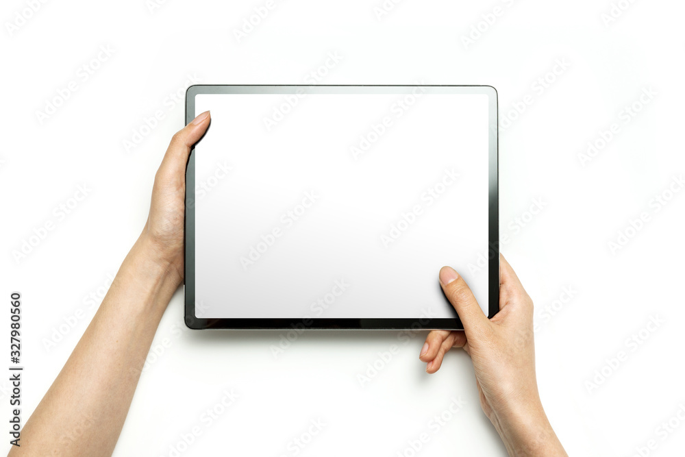Woman hand hold a tablet isolated on white. Woman hand hold a tablet isolated on white.