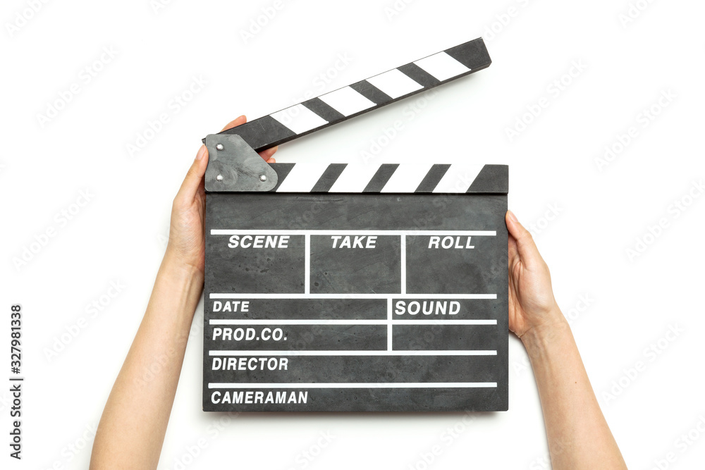 Woman hand hold a movie clapper isolated on white.