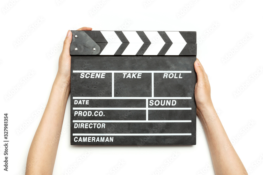 Woman hand hold a movie clapper isolated on white.