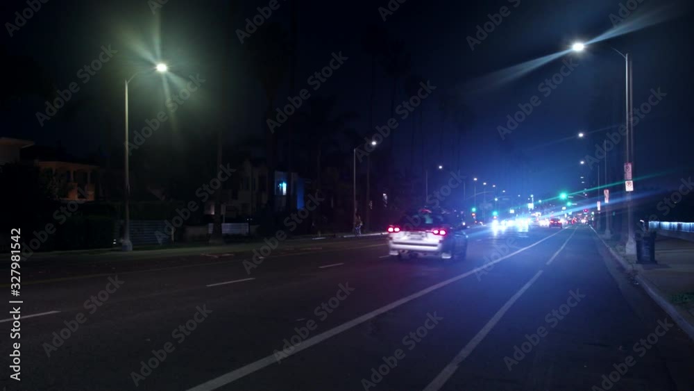 Static view of traffic in Venice Beach road in Los Angeles at night time. Static view of traffic in Venice Beach road in Los Angeles at night time.