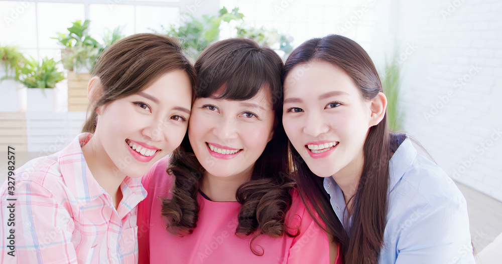 two daughter with mother smile two daughter with mother smile