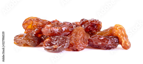 Raw raisins, dried grape isolated on white background