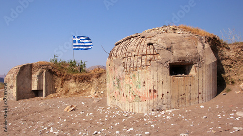 Abandoned military concrete bunker on the shore, Rhodes, Greece