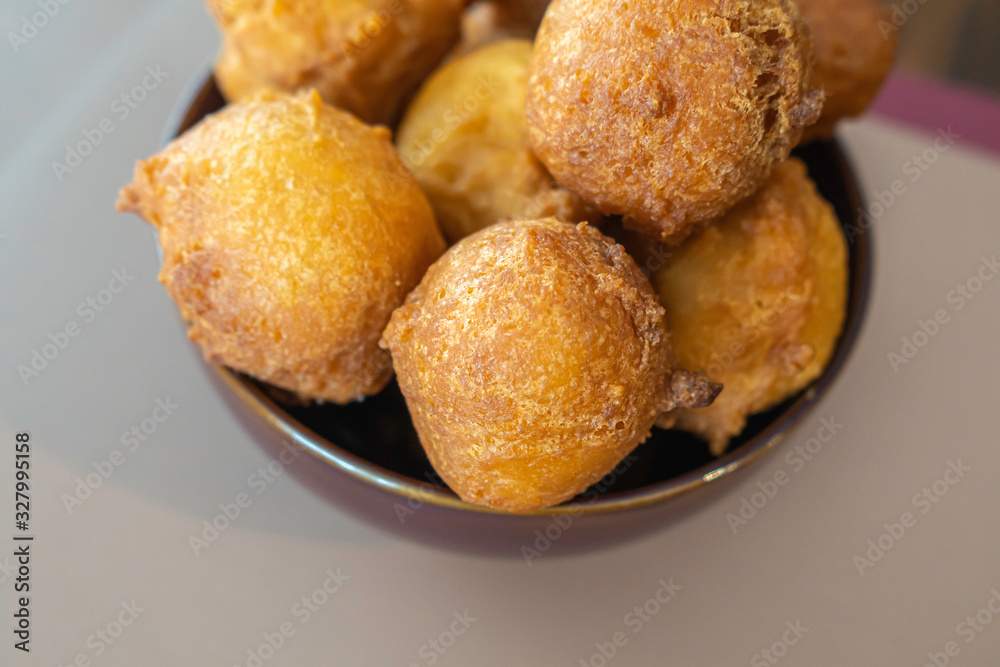 Bowl full of Nigerian buns ready to eat Bowl full of Nigerian buns ready to eat