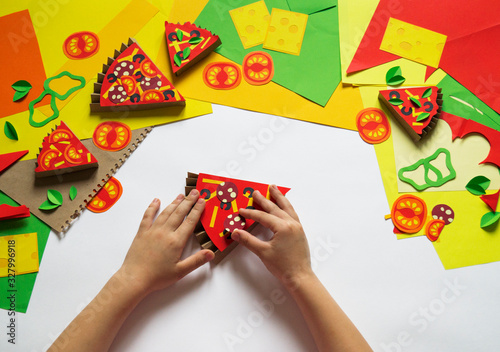 Pizza made of paper. Fast food.