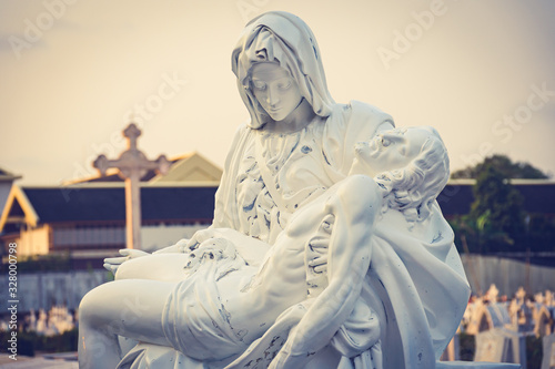 La Pieta statue - The blessed Virgin Mary holding dead Jesus Christ body photo