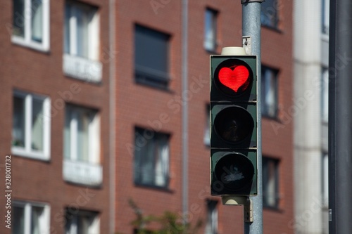 traffic light with red heart outline