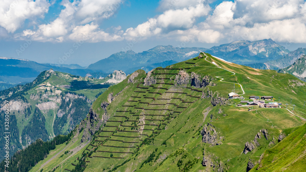 Switzerland, Panoramic view on Berghaus Männlichen and green Alps around 