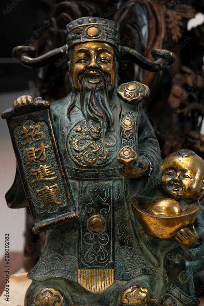 Chinese traditional bronze statue of the God of wealth Chinese traditional bronze statue of the God of wealth