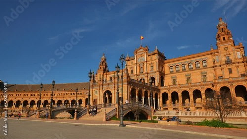 4K Timelapse in Seville 's famous Spain Square with tourists visiting, with beautiful Architecture Details and Horse carriages.