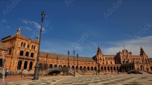 4K Timelapse in Seville City Center with tourists enjoying Plaza de Espana and its bridges and the architecture details.