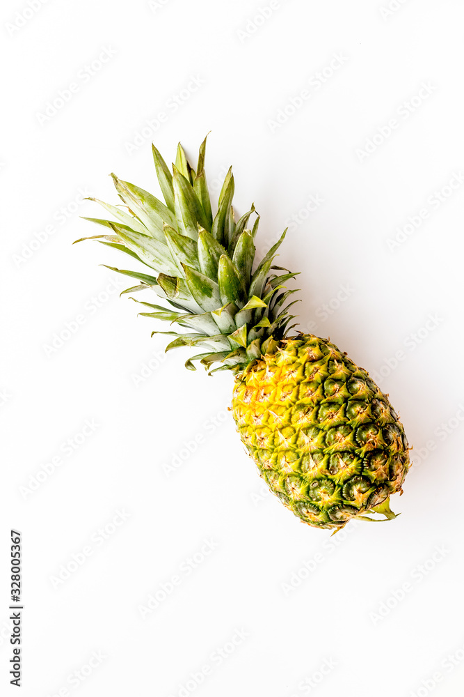 Pineapple - whole fruit - on white background top-down Pineapple - whole fruit - on white background top-down