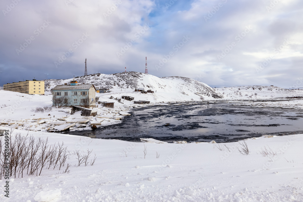 The old fishing village on the shore of the Barents sea, the Kola Peninsula, Teriberka, Russia The old fishing village on the shore of the Barents sea, the Kola Peninsula, Teriberka, Russia