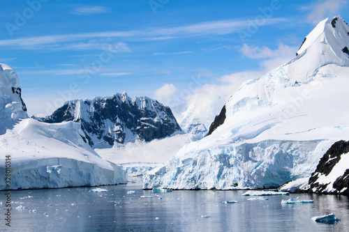 Landscape of snowy mountains of the Lemaire Channel in the Antarctic Peninsula, Antarctica