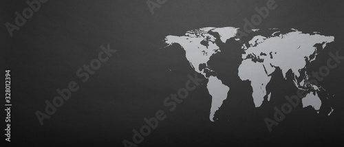 Fototapeta a world map on grey paper background