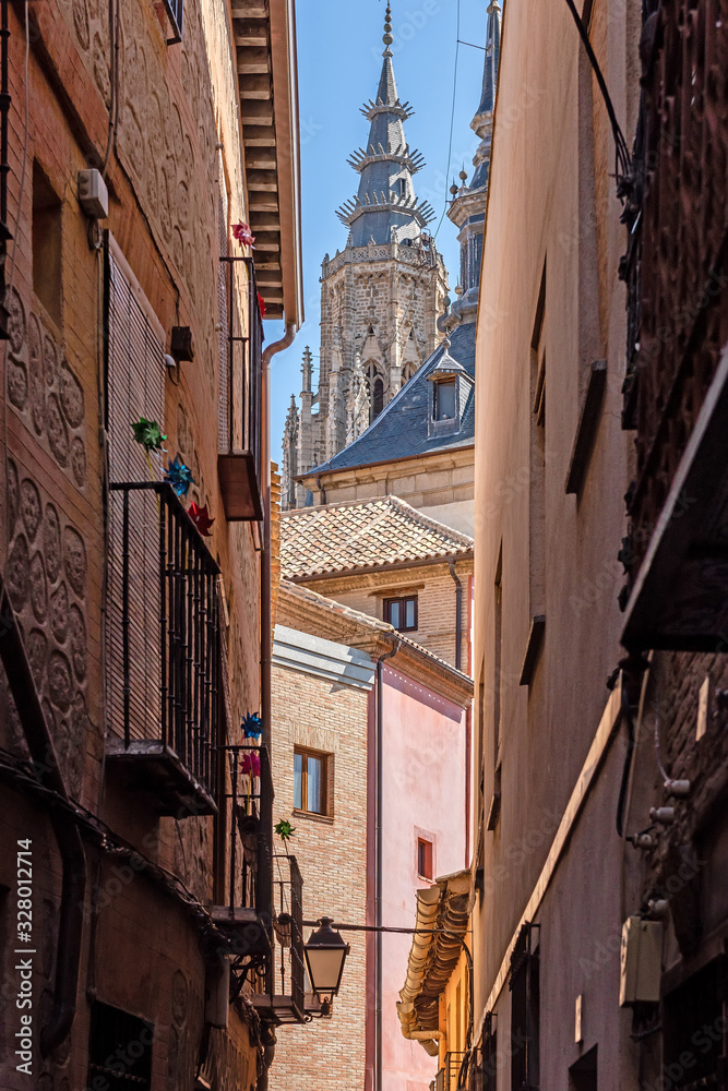 Medieval cobblestone narrow street in the city of Toledo. Spain
