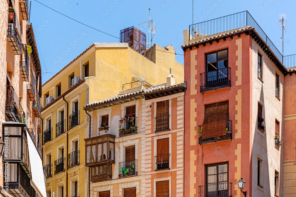 Toledo buildings on narrow old city street, Spain