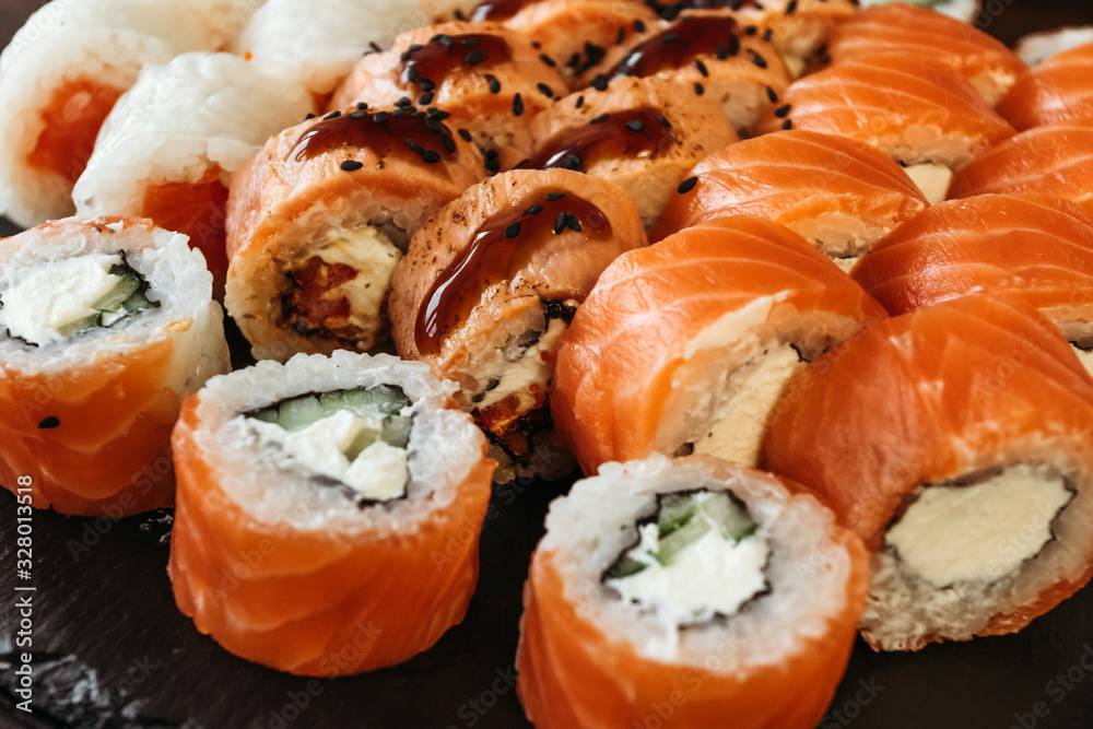 Jpanese sushi food. Philadelphia Salmon Sushi. Top view of sushi. Jpanese sushi food. Philadelphia Salmon Sushi. Top view of sushi.