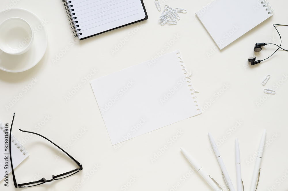 Workspace with pen, paper, coffee cup and office supplies. Workspace with pen, paper, coffee cup and office supplies.