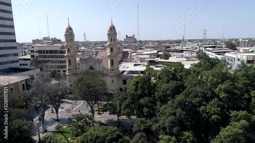 Forward aerial drone view move of the Cathedral of Piura at a sunny afternoon in Piura Region, Peru photo